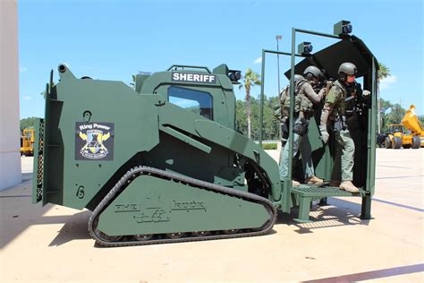 pa state police skid steer|Pa. State Police use the Rook, a modified Cat 287C, to breach .